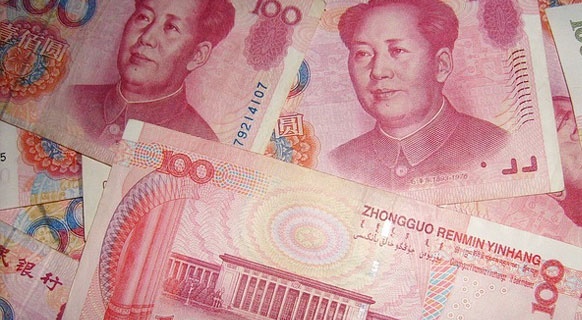 Yuanul chinezesc şi-a făcut intrarea între principalele valute ale lumii